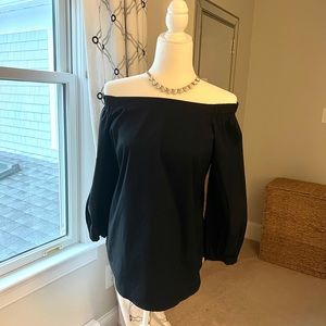 White House Black Market black blouse. Square neck and sits on shoulders. EUC